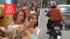 Bản tin 30s Nóng: Thực hư vụ giành giật mua chung cư ở TP.HCM; Người phụ nữ rải bột lạ xuống đường