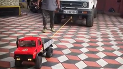 Độc lạ xe đồ chơi kéo xe ô tô thật nặng cả tấn