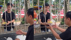 Chàng trai làm 'ảo thuật' đưa đĩa đồ ăn qua song sắt siêu đỉnh