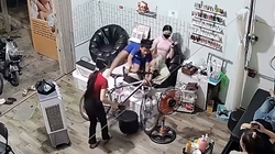 Bé trai phóng xe đạp vào tiệm nail nhanh như một cơn gió