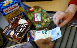 EU takes small steps in uphill struggle to wean savers off cash