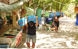 On a steep climb, porters haul heavy loads up sacred mountain in Vietnam’s Tay Ninh