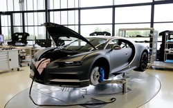 Porsche to sell stake in sports car maker Bugatti