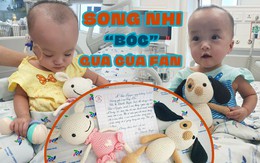 Cặp sinh đôi Trúc Nhi - Diệu Nhi dần hồi phục, ngồi bóc quà của 'fan', lắc lư theo điệu nhạc Baby Shark