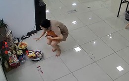 Robot lau nhà liên tục ghé bàn thờ ông địa xin bánh