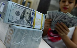 Vàng và USD cùng  hạ nhiệt