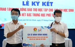 Đàm Vĩnh Hưng bảo trợ học tập cho 100 em có hoàn cảnh khó khăn do COVID-19