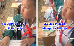 Cậu bé ấm ức vì bị lớp trưởng mách cô giáo chưa làm bài tập về nhà