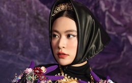 Hoàng Thùy Linh đội khăn mỏ quạ, hóa bà già nói 'bo xì' điều tiêu cực của năm cũ