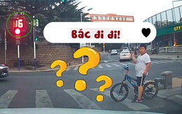 Cậu bé thách thức tài xế ô tô vượt đèn đỏ