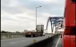 Phạt lái xe container chạy ngược chiều trên cầu Phú Hữu