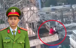 Phút thót tim giải cứu cô gái ngồi vắt vẻo trên tòa tháp 27 tầng