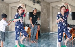 Bố mẹ đóng giả người máy vui đùa với con