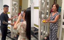 Người phụ nữ ngơ ngác trước màn trao quà từ thiện của nhà hảo tâm