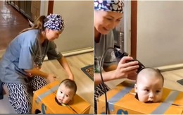 Mẹ dùng tuyệt chiêu để con nhỏ chịu ngồi yên khi cắt tóc