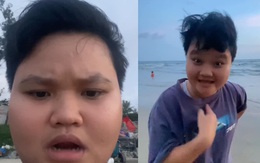 Cô gái bực bội khi nhờ bạn quay video ngắm biển