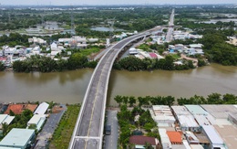 Cầu nối huyện Bình Chánh với Nhà Bè sắp thông xe, người dân hết cảnh 'qua sông phải lụy đò'