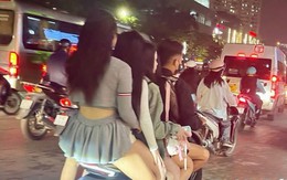 Phạt tài xế xe ôm 'kẹp' 4 cô gái trên đường Trần Duy Hưng