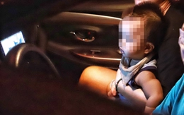 Chở trẻ em trên ô tô phải lắp ghế an toàn, không được ngồi hàng trước