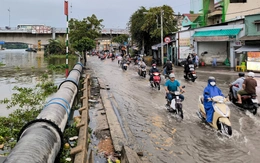 Nâng đường Trần Xuân Soạn có lãng phí khi ở ngay cạnh dự án chống ngập?