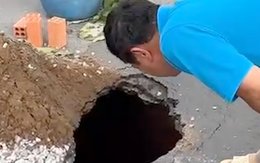 Xuất hiện 'hố tử thần' sâu 2 mét ngay trước đèn giao thông ở TP.HCM