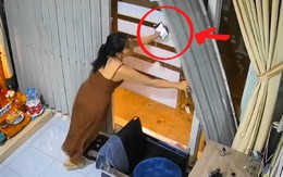 Cô gái làm sập cửa sắt vẫn quyết tâm không buông điện thoại