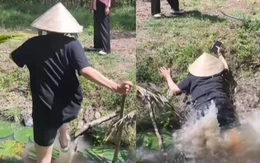 Cô gái vồ ếch khi nhảy qua mương nước