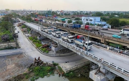 Xem cảnh 10 xe tải lớn 'thử sức' cầu Bình Phước 1 sau khi nâng cao thêm