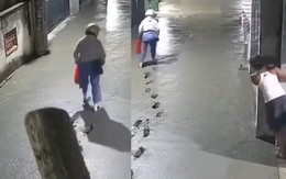 Người phụ nữ để lại hàng trăm dấu chân trên đường bê tông vừa đổ