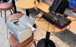 Ảnh vui 29-12: Mang cả văn phòng đến quán cà phê