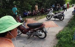 Trên đường đi vườn về thì bị đâm chết, chiếc rìu còn trên ngực