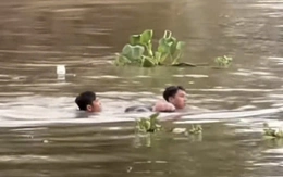 Hai thanh niên nhảy sông cứu người phụ nữ đuối nước
