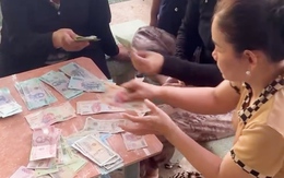 Video 2 người phụ nữ kể chuyện làm rơi, nhặt được cọc tiền 55 triệu bị chó tha ở chợ