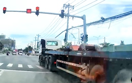 Người dân quay video xe container vượt đèn đỏ trên quốc lộ 13, tài xế bị phạt 24 triệu