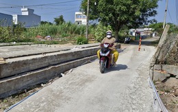 Cầu xây mãi không xong, dân tự ý lấp rạch làm đường đi