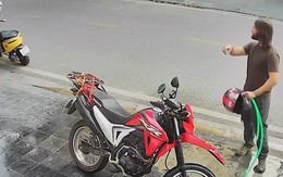 Anh chàng ngoại quốc lấy vòi nước trước nhà rửa xe vì tưởng là vòi nước công cộng