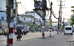 Vì sao 200 cột điện trên đường Nguyễn Thị Định chưa thể di dời?