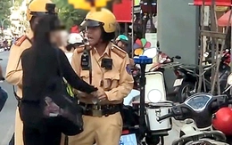 Cô gái giật biên bản của Cảnh sát giao thông Bàn Cờ do lo lắng mức phạt nên hành động bộc phát