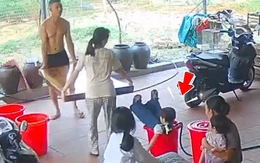 Con gái lọt thỏm vào xô nước vì nhiệt tình giúp đỡ ba