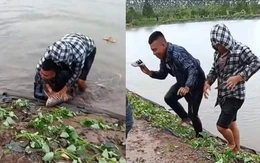 Hai thanh niên giữ được con cá khủng, hỏng mất 2 điện thoại