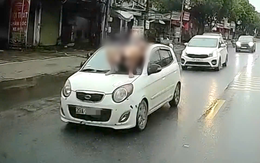 Mâu thuẫn với bố vợ, nam thanh niên nằm trên kính chắn gió ô tô đang chạy trên đường