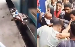 Người cha dũng cảm lao xuống đường ray cứu con thoát chết trong gang tấc khi đoàn tàu chạy qua