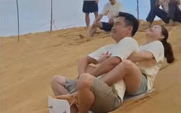 Cặp đôi lộn santo khi chơi trò trượt cát