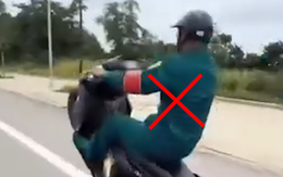 Tịch thu xe máy của thanh niên mặc trang phục dân quân tự vệ, chạy xe bằng một bánh