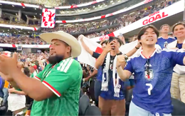 Cổ động viên Nhật Bản reo hò trên sân Dallas khi đội nhà vượt qua vòng bảng World Cup  