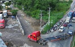 Các phường nhiều lần đề nghị đóng đấu nối bãi xe container tự phát dọc đường Võ Chí Công