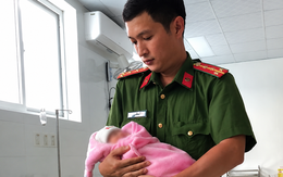 Bé sơ sinh bị bỏ trước cổng chùa, công an xã vội vàng đến giúp