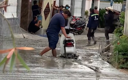Phớt lờ cảnh báo, người đàn ông mắc kẹt giữa đoạn đường đang làm dở