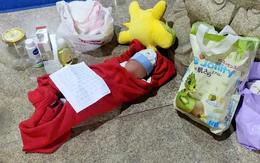 Bé trai sơ sinh bị bỏ rơi trước chùa, để lại giấy nhờ sư cô nuôi giúp