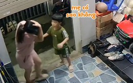 Mẹ đụng đầu vào cửa cuốn, phản ứng của con trai gây bão mạng